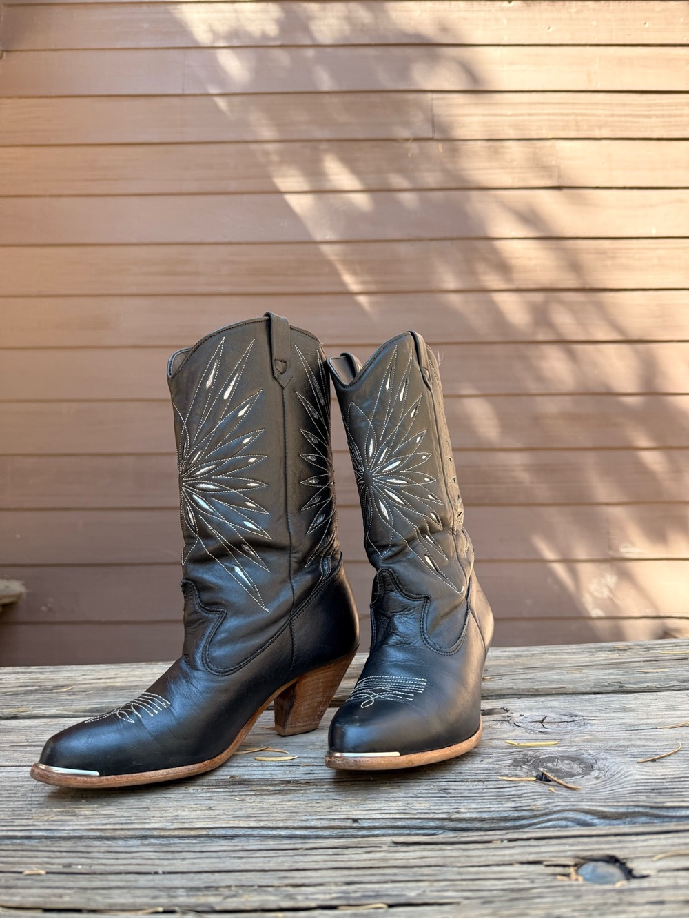 Vintage Black Dingo boots with metallic accents